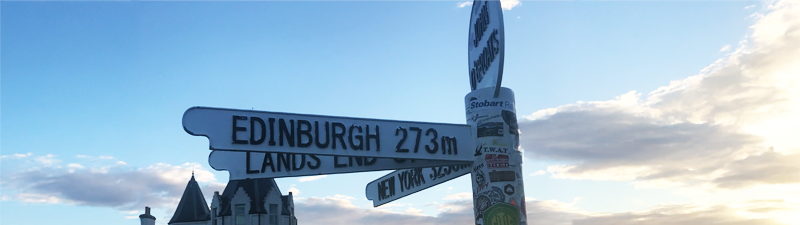 A photograph of the famous road sign at John O'Groats